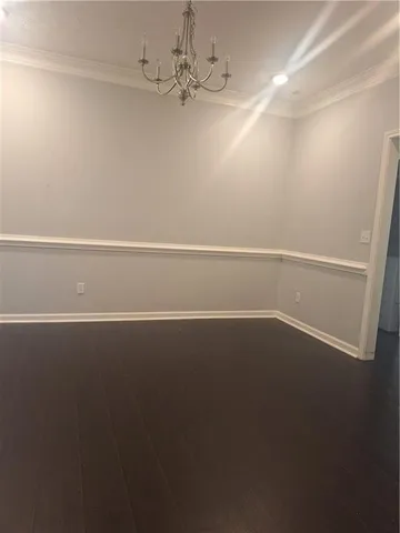 a view of a room with an empty space