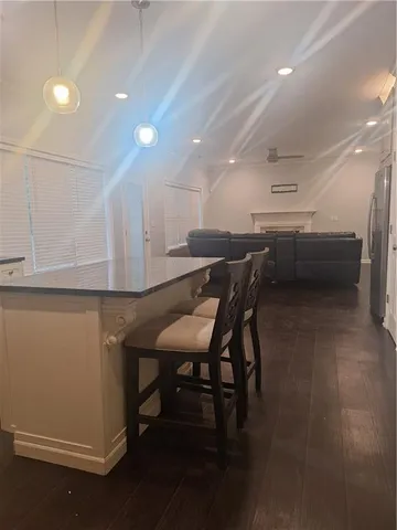 a kitchen with a table and chairs in it