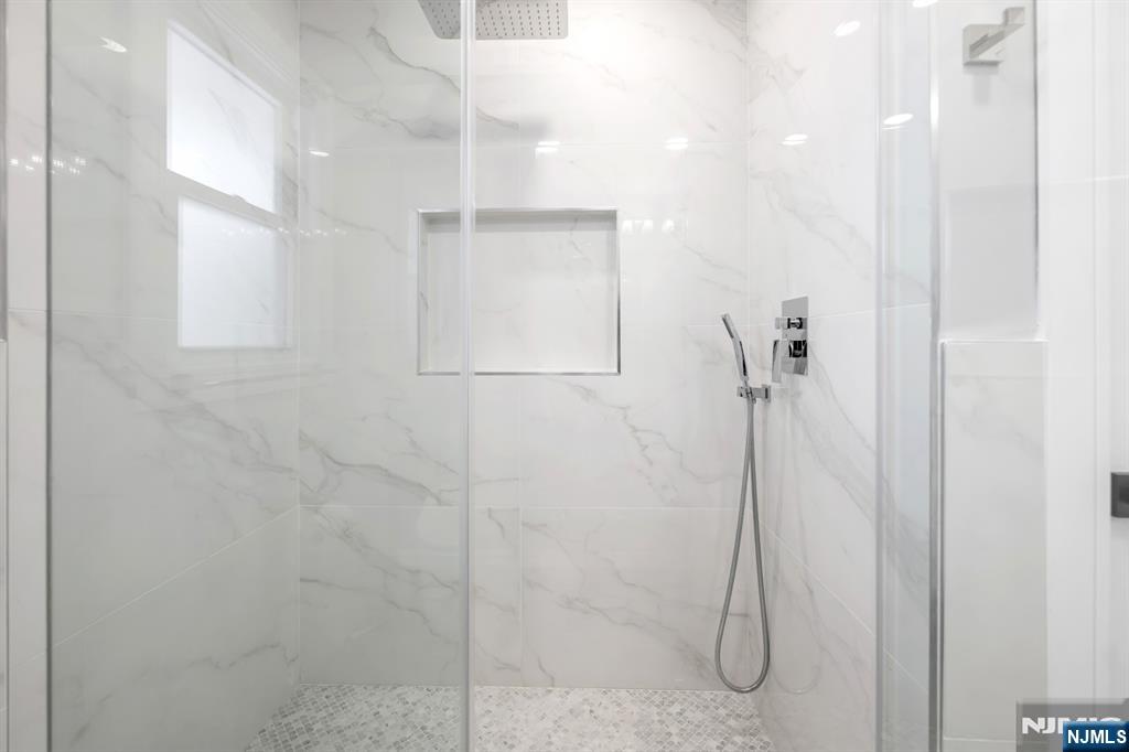 475 Cedar Lane Paramus, NJ 07652 - Photo 12 of 31 a bathroom with a shower
