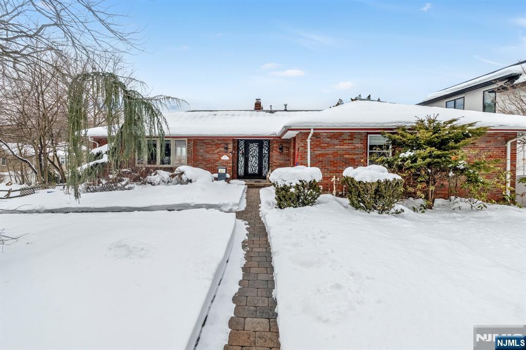 475 Cedar Lane Paramus, NJ 07652 - Photo 27 of 31 a view of a house with a patio