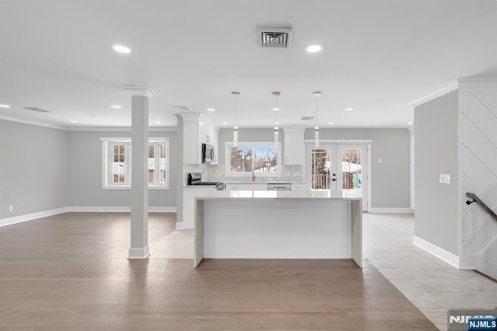 475 Cedar Lane Paramus, NJ 07652 - Photo 3 of 31 a view of kitchen with stainless steel appliances refrigerator sink and cabinets