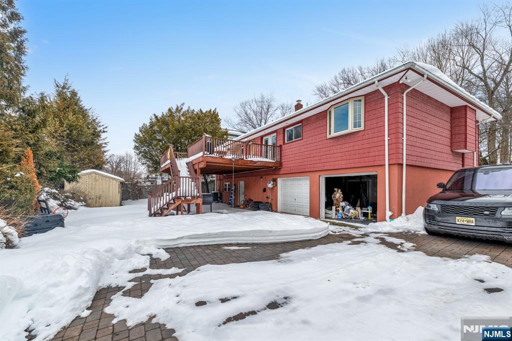 475 Cedar Lane Paramus, NJ 07652 - Photo 31 of 31 a view of a house with a patio