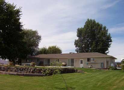 171 Schlect Road Yakima, WA 98908 - Photo 6 of 8 a front view of house with yard and green space