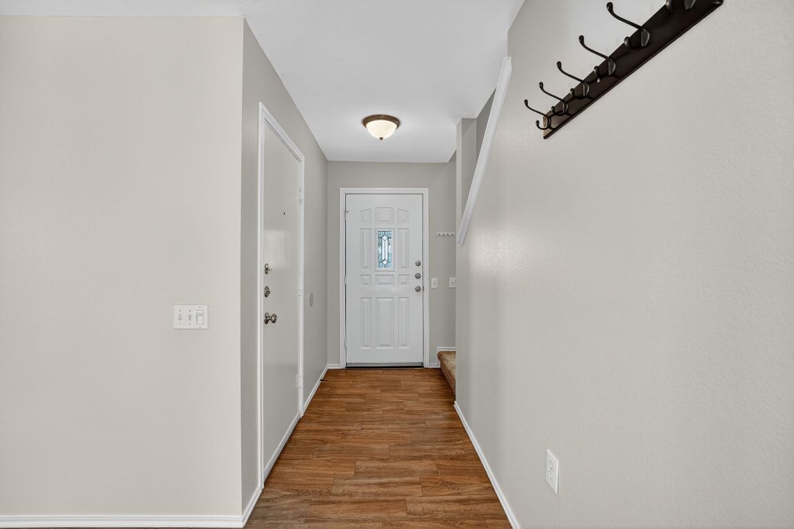 1520 Anise Drive Austin, TX 78741 - Photo 12 of 30 a view of a hallway with a white door