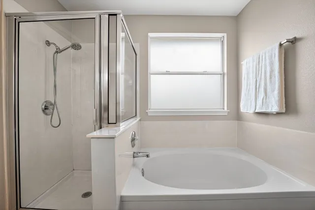 a bathroom with a sink vanity mirror and toilet