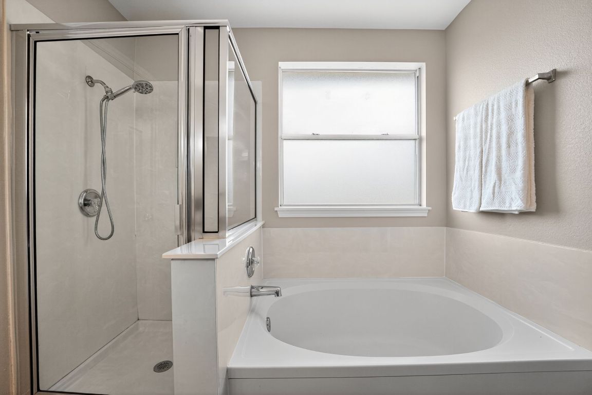 1520 Anise Drive Austin, TX 78741 - Photo 22 of 30 a white bath tub sitting next to a window