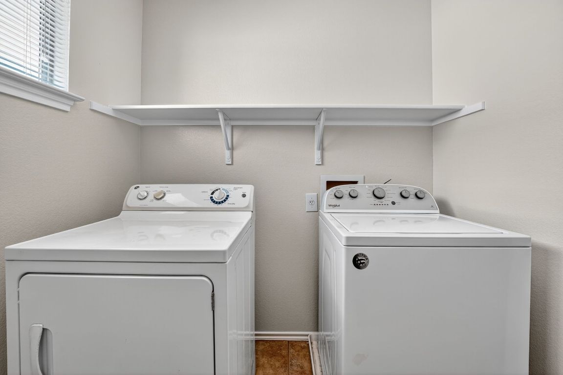 1520 Anise Drive Austin, TX 78741 - Photo 26 of 30 a utility room with dryer and washer