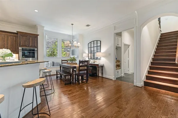 a kitchen with appliances cabinets and a window