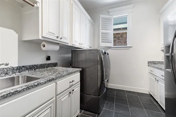 a bedroom with a bed and a desk