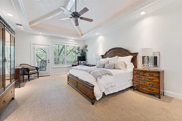a en suite bathroom with a sink double vanity and a mirror