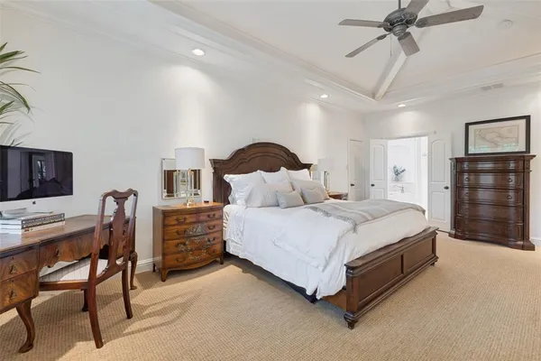 a bathroom with a bathtub a sink a mirror and a shower