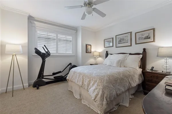 a view of a patio with couches table and chairs and potted plants