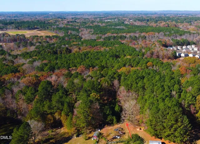 an aerial view of a house with a outdoor space