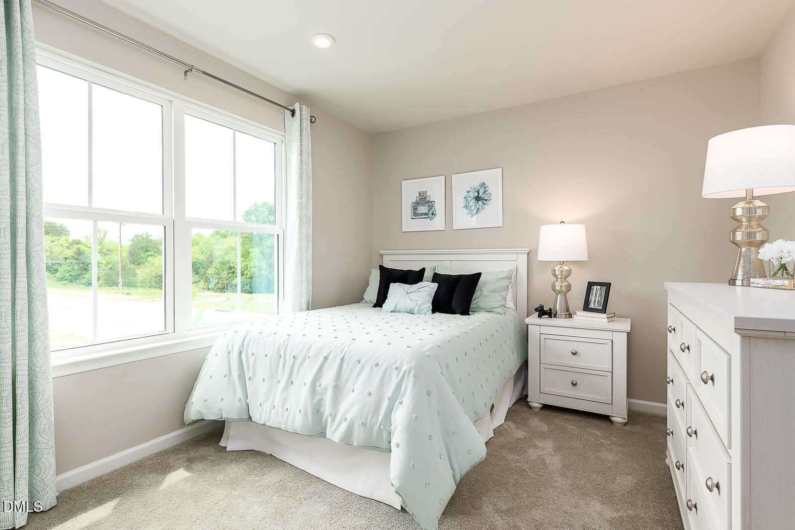 868 Walker Rdg Way Willow Spring, NC 27592 - Photo 25 of 28 a bedroom with a bed and a large window