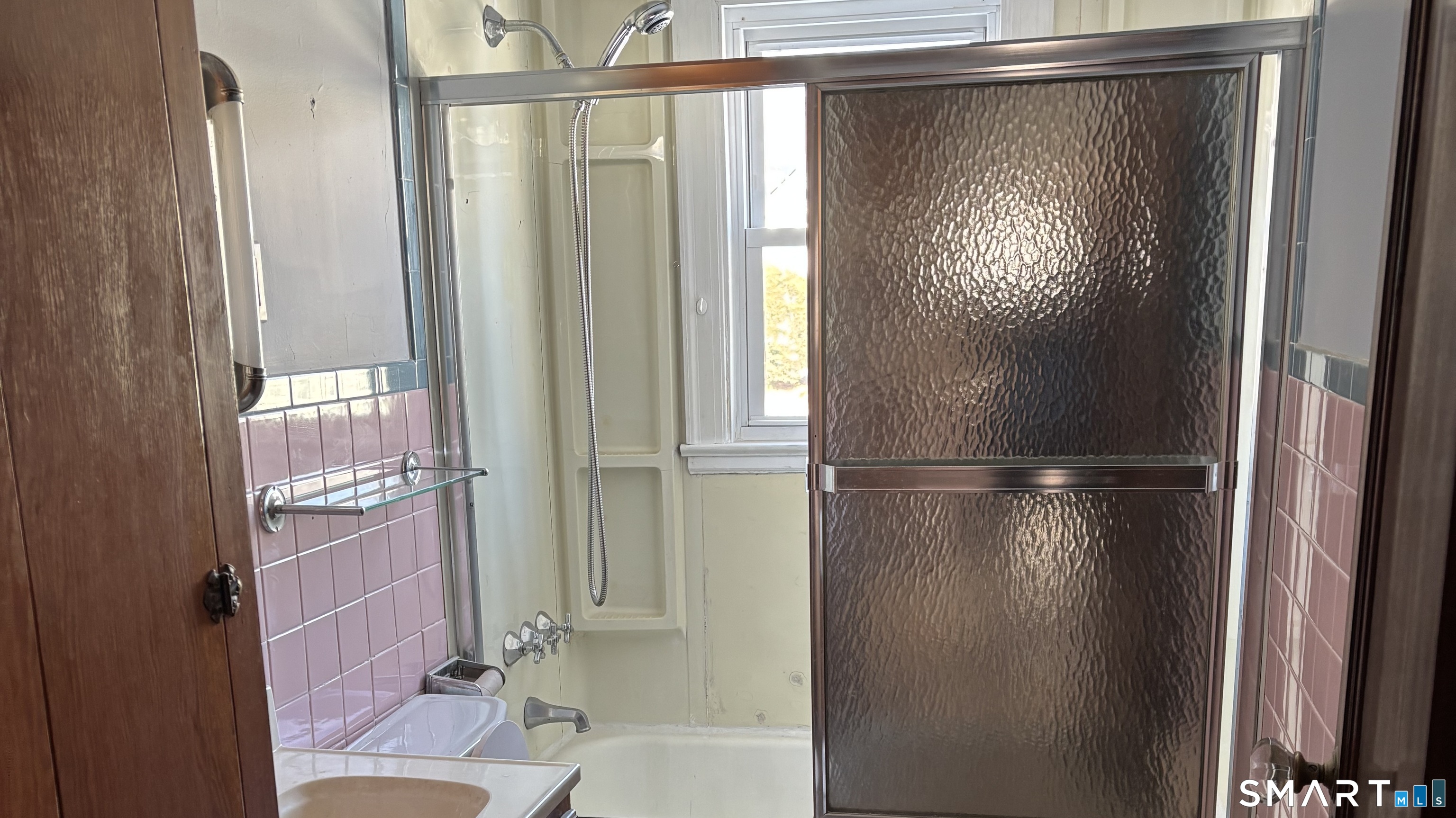 460 Stonybrook Road Stratford, CT 06614 - Photo 11 of 19 a bathroom with a glass shower door