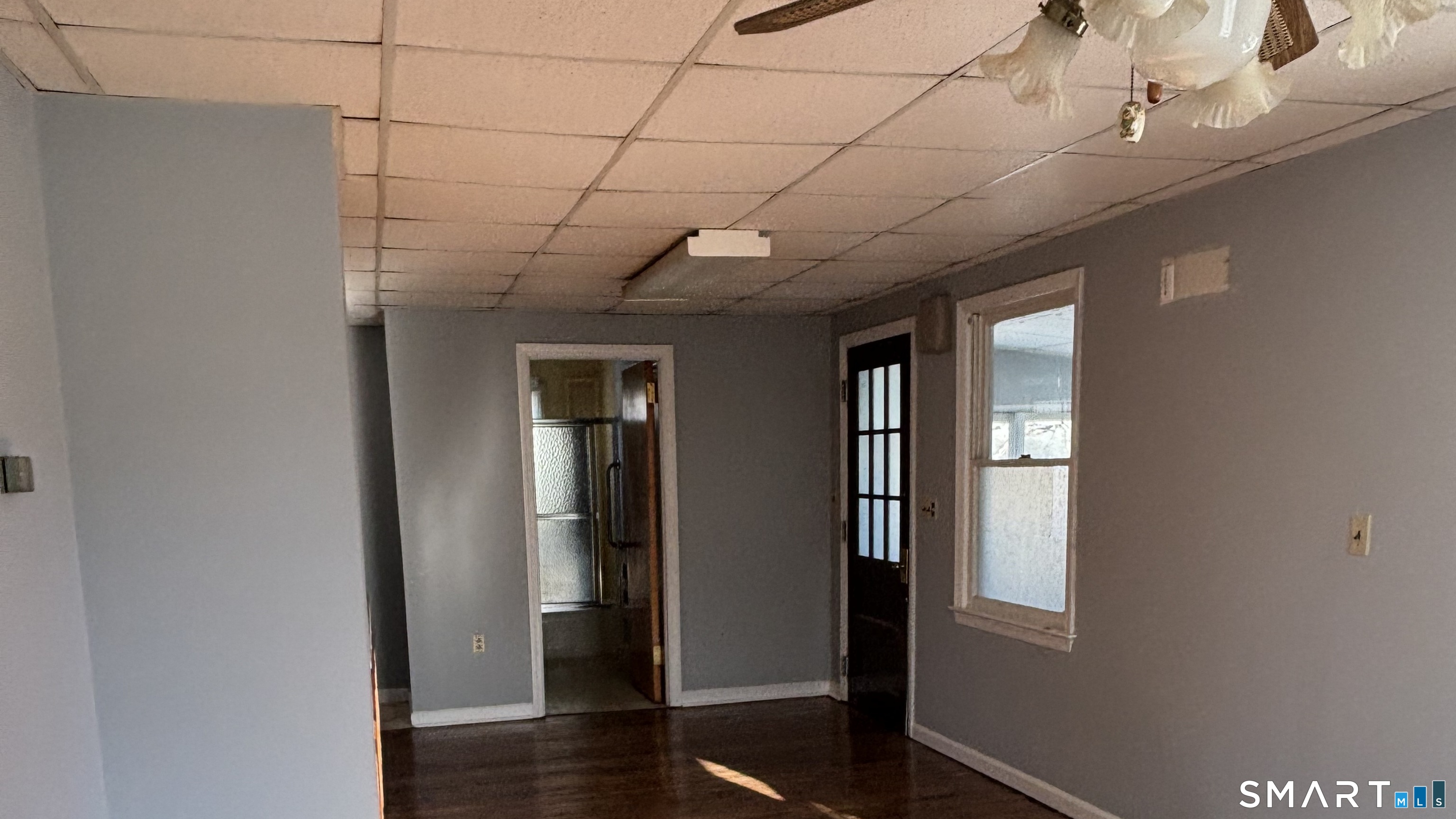460 Stonybrook Road Stratford, CT 06614 - Photo 14 of 19 a view of a room with wooden floor