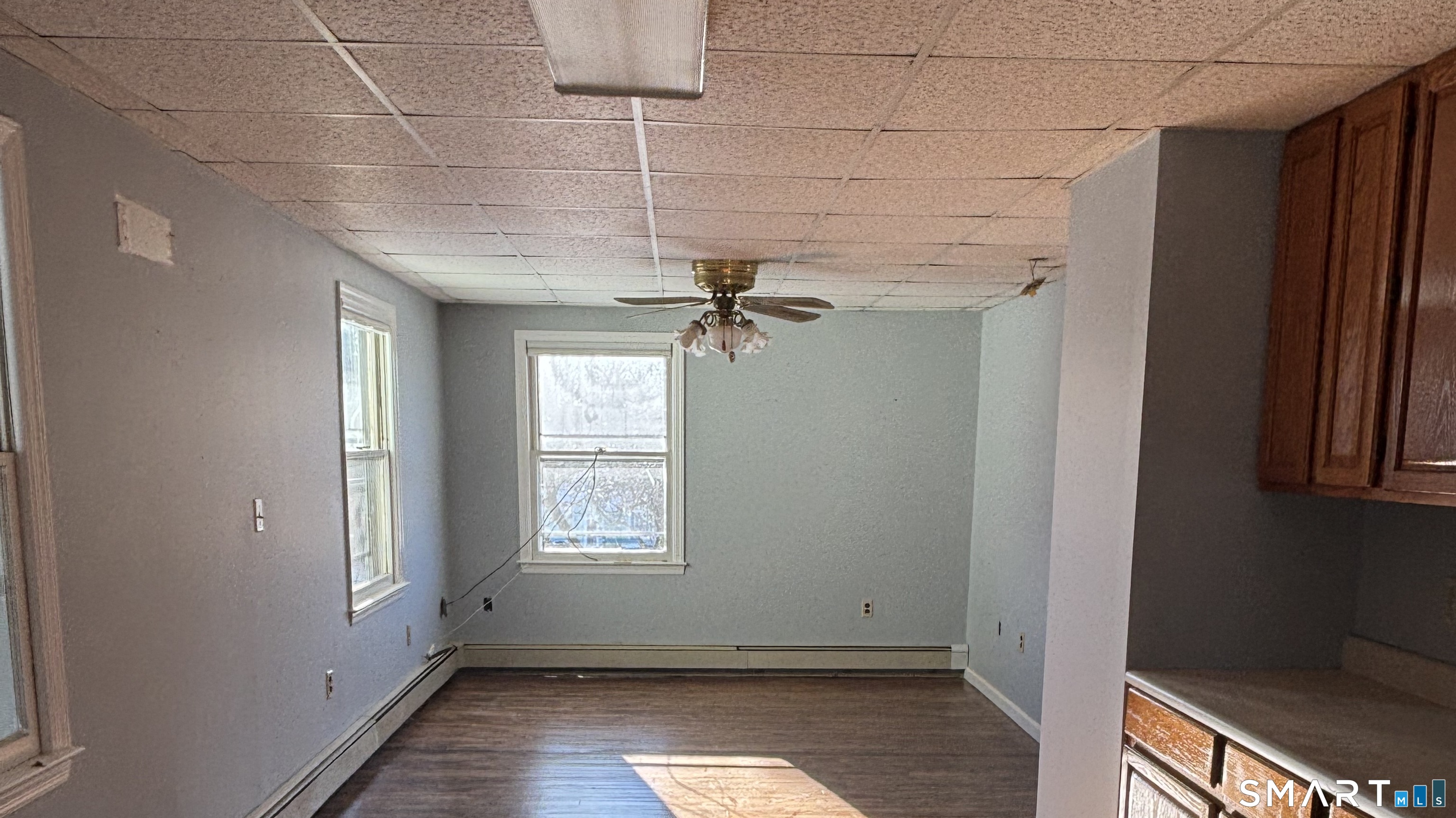 460 Stonybrook Road Stratford, CT 06614 - Photo 15 of 19 an empty room with windows