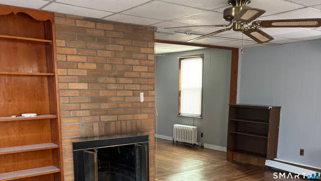 a bathroom with a sink a mirror and a shower