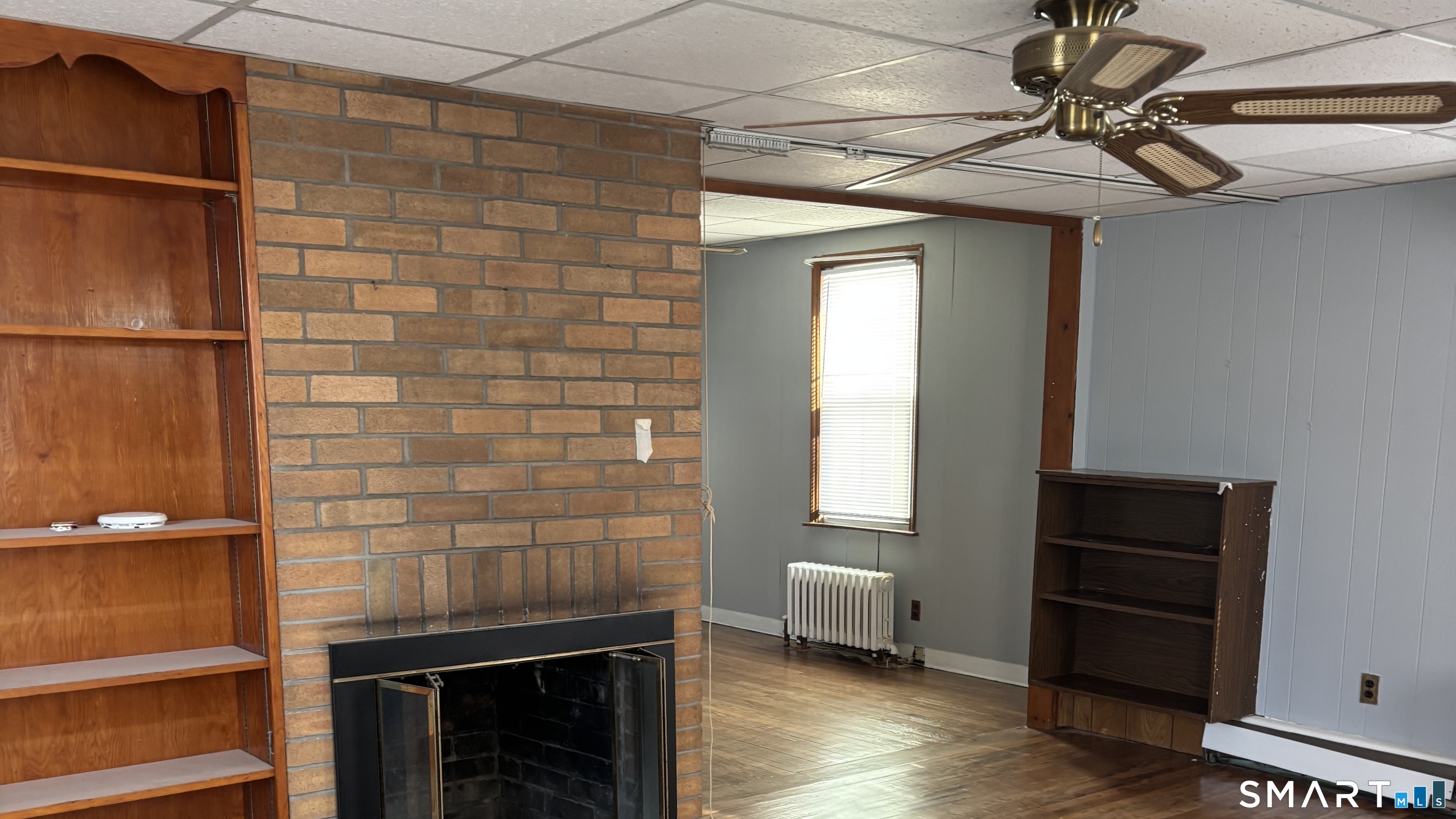 460 Stonybrook Road Stratford, CT 06614 - Photo 3 of 19 a bathroom with a sink a mirror and a shower