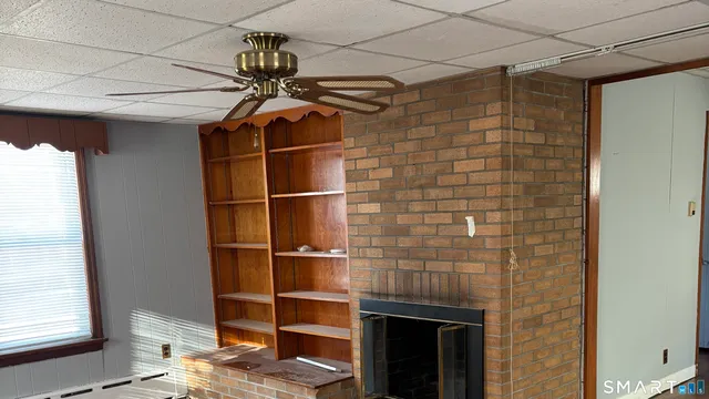 a room with a walk in closet and a window