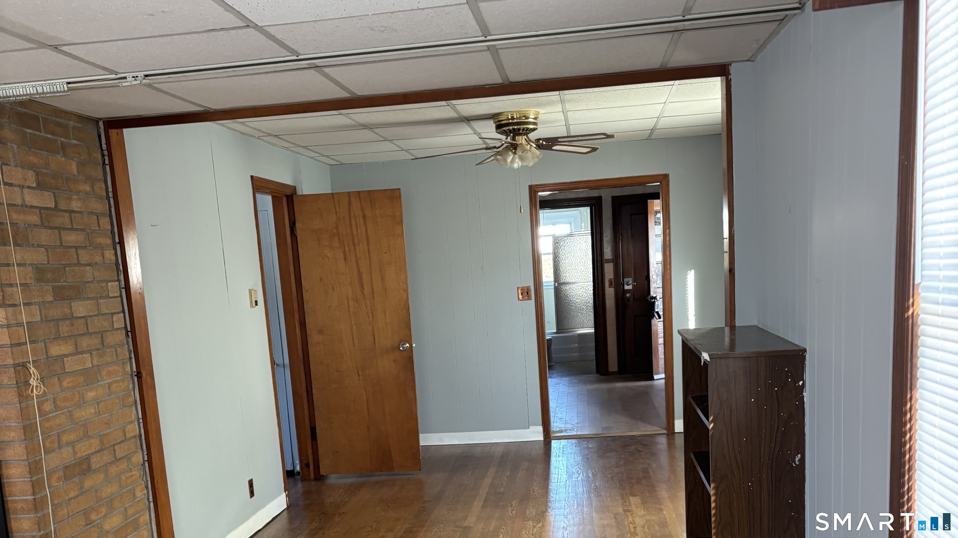 460 Stonybrook Road Stratford, CT 06614 - Photo 6 of 19 a view of a hallway with wooden floor and closet