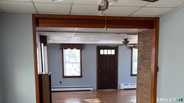 a view of an entryway with a fireplace