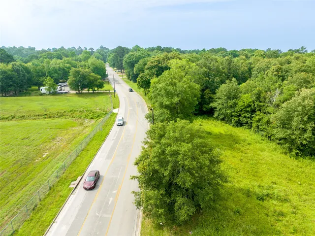 a view of a lake with a yard