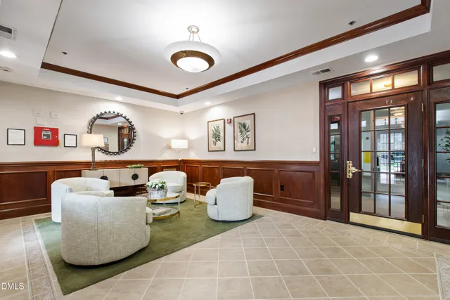 a living room with furniture and window
