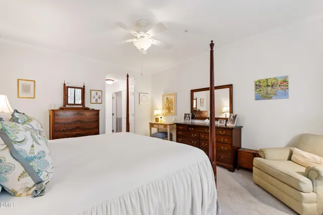 a view of a hallway with wooden shelves