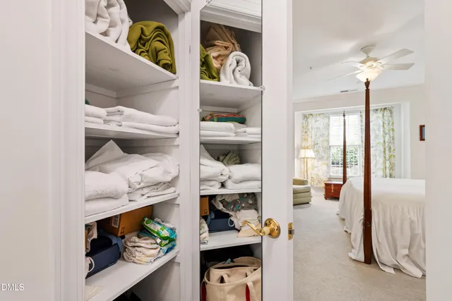 a spacious bathroom with a double vanity sink mirror and double