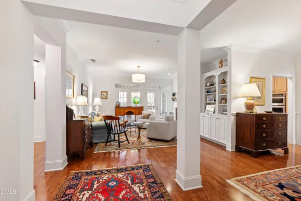 a view of a livingroom with furniture and a flat screen tv