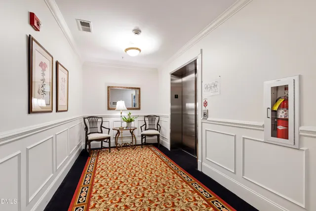 a view of a car parked in the parking area