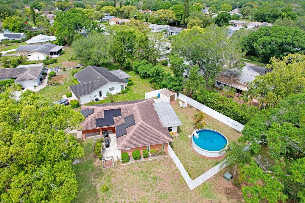 1632 Heather Place Palm Harbor, FL 34684 - Photo 11 of 53 an aerial view of a house with yard