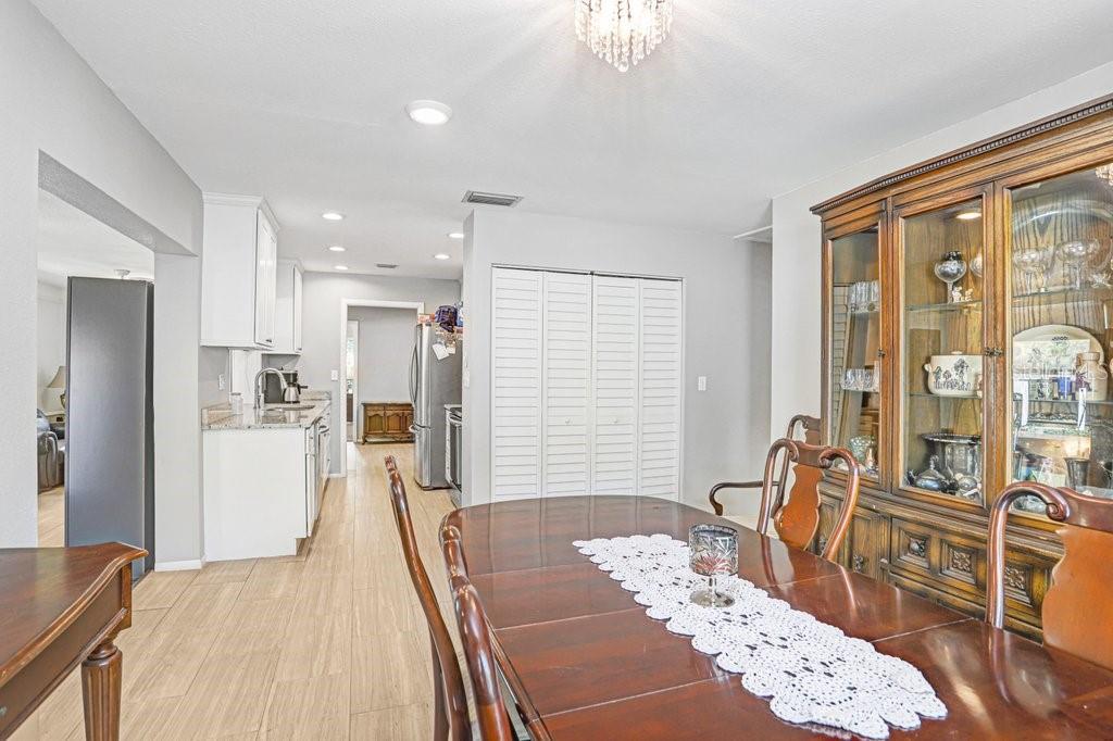 1632 Heather Place Palm Harbor, FL 34684 - Photo 29 of 53 a bedroom with furniture and a large window