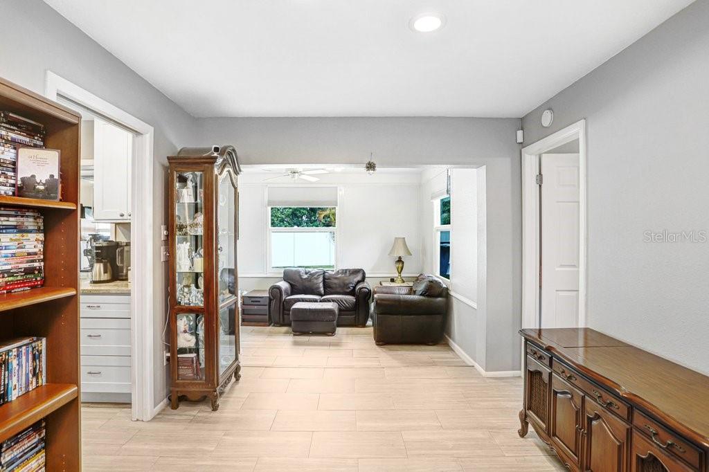 1632 Heather Place Palm Harbor, FL 34684 - Photo 35 of 53 a living room with furniture and a flat screen tv