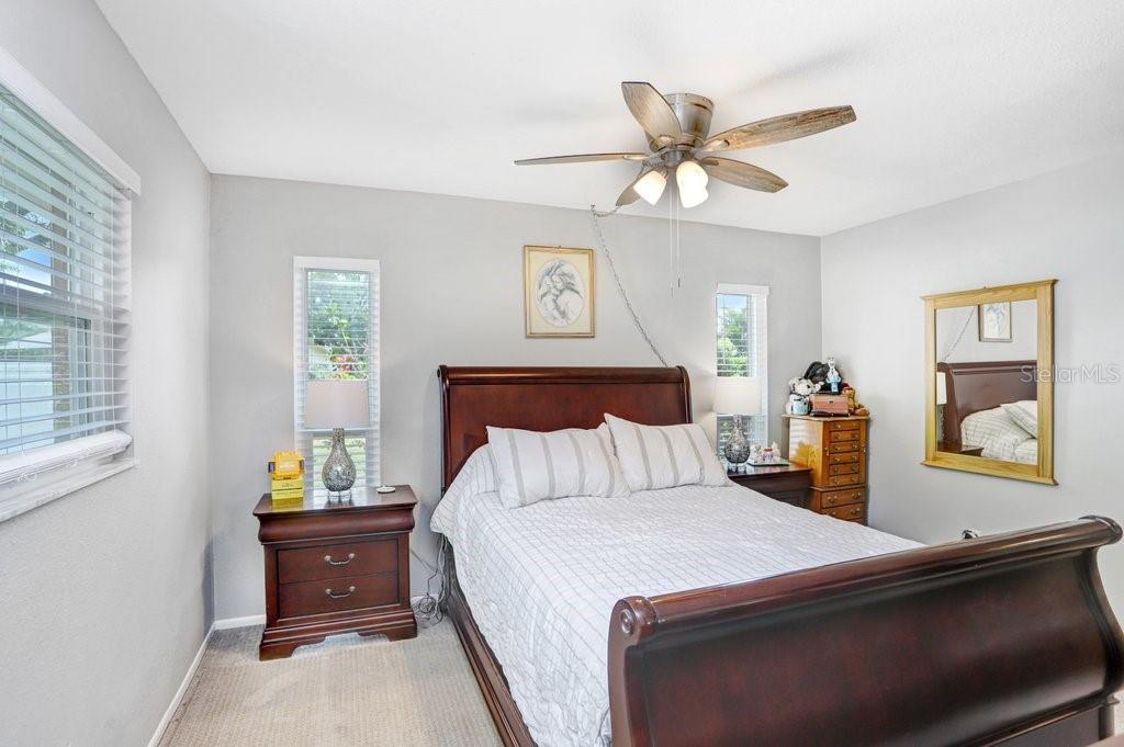 1632 Heather Place Palm Harbor, FL 34684 - Photo 38 of 53 a bedroom with a bed and window