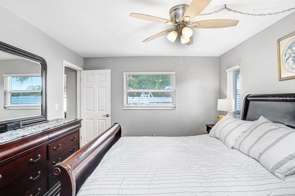 1632 Heather Place Palm Harbor, FL 34684 - Photo 40 of 53 a bedroom with a bed and a window