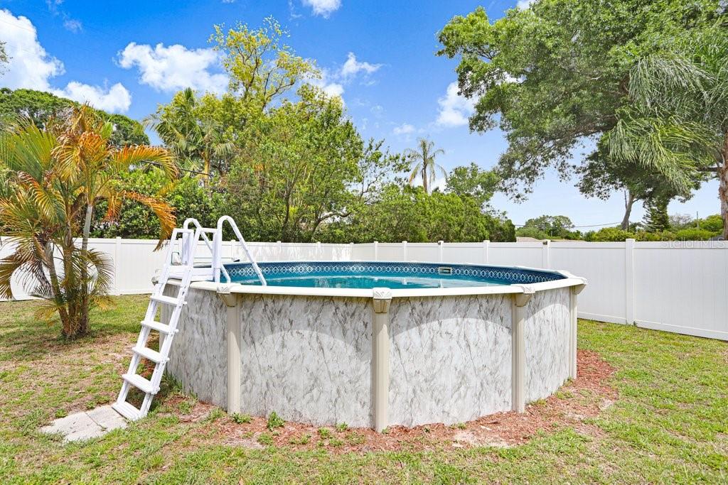 1632 Heather Place Palm Harbor, FL 34684 - Photo 50 of 53 a view of a backyard with plants
