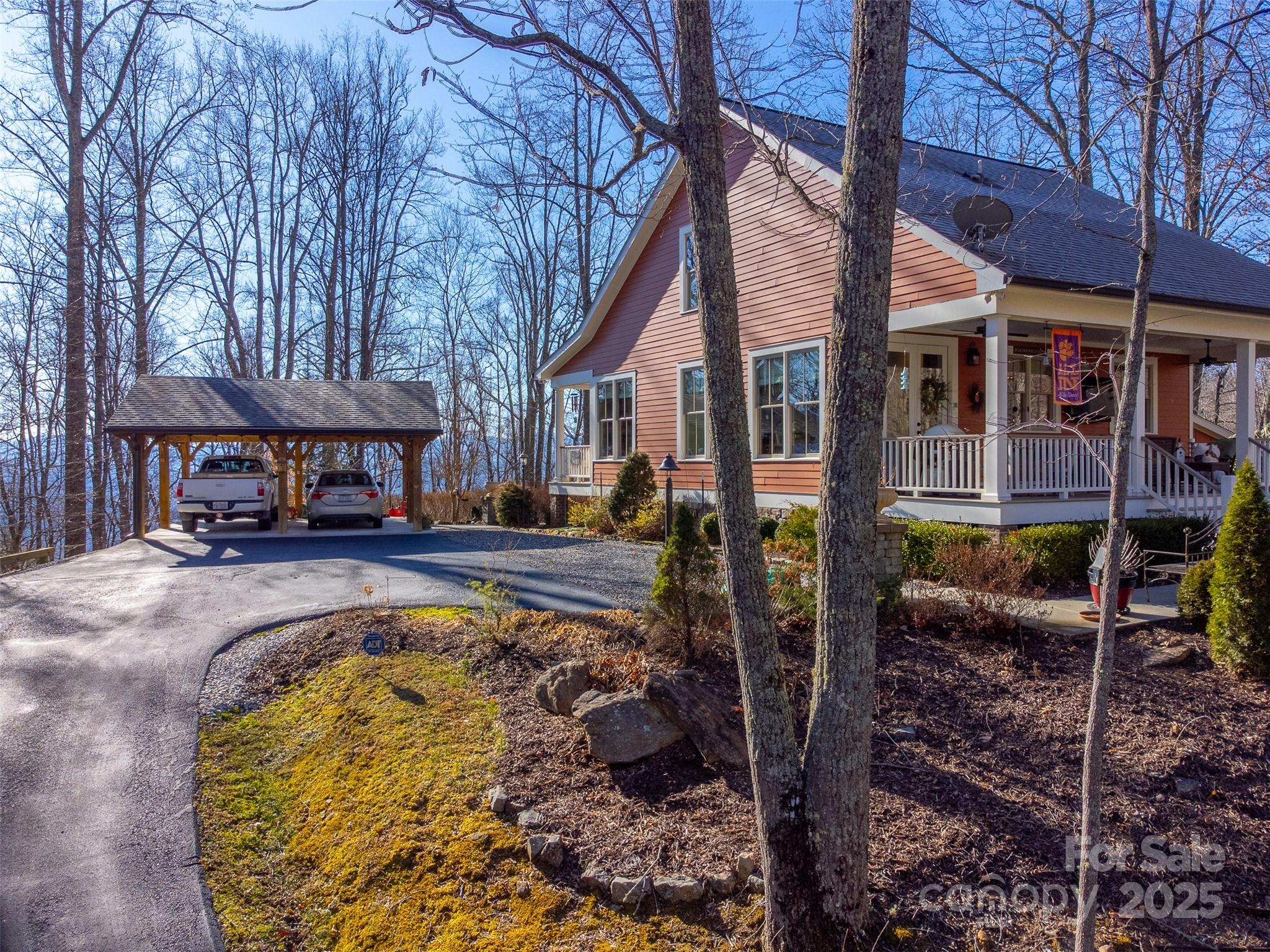 1226 Monteith Branch Road Sylva, NC 28779 - Photo 14 of 40 a swimming pool with outdoor seating and yard