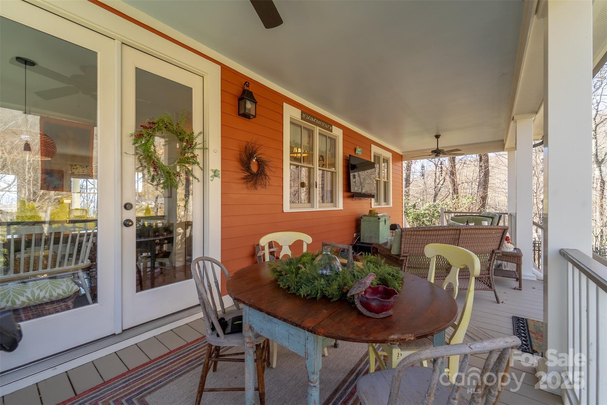 1226 Monteith Branch Road Sylva, NC 28779 - Photo 20 of 40 a view of a dining room with furniture window and wooden floor