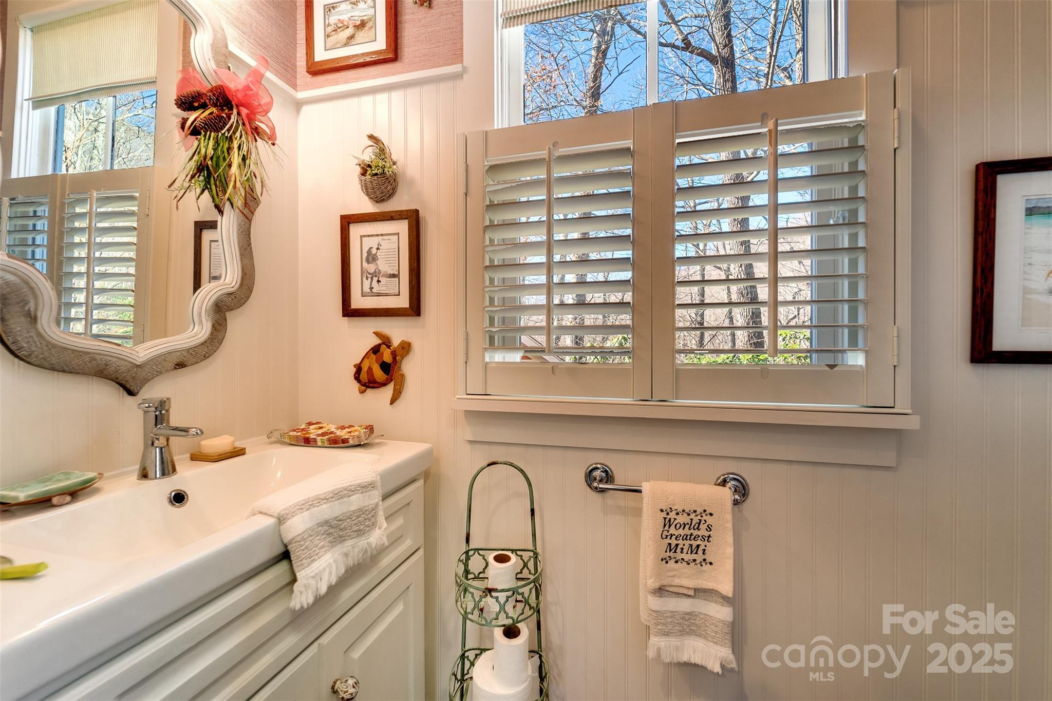 1226 Monteith Branch Road Sylva, NC 28779 - Photo 27 of 40 a bathroom with a sink and a window