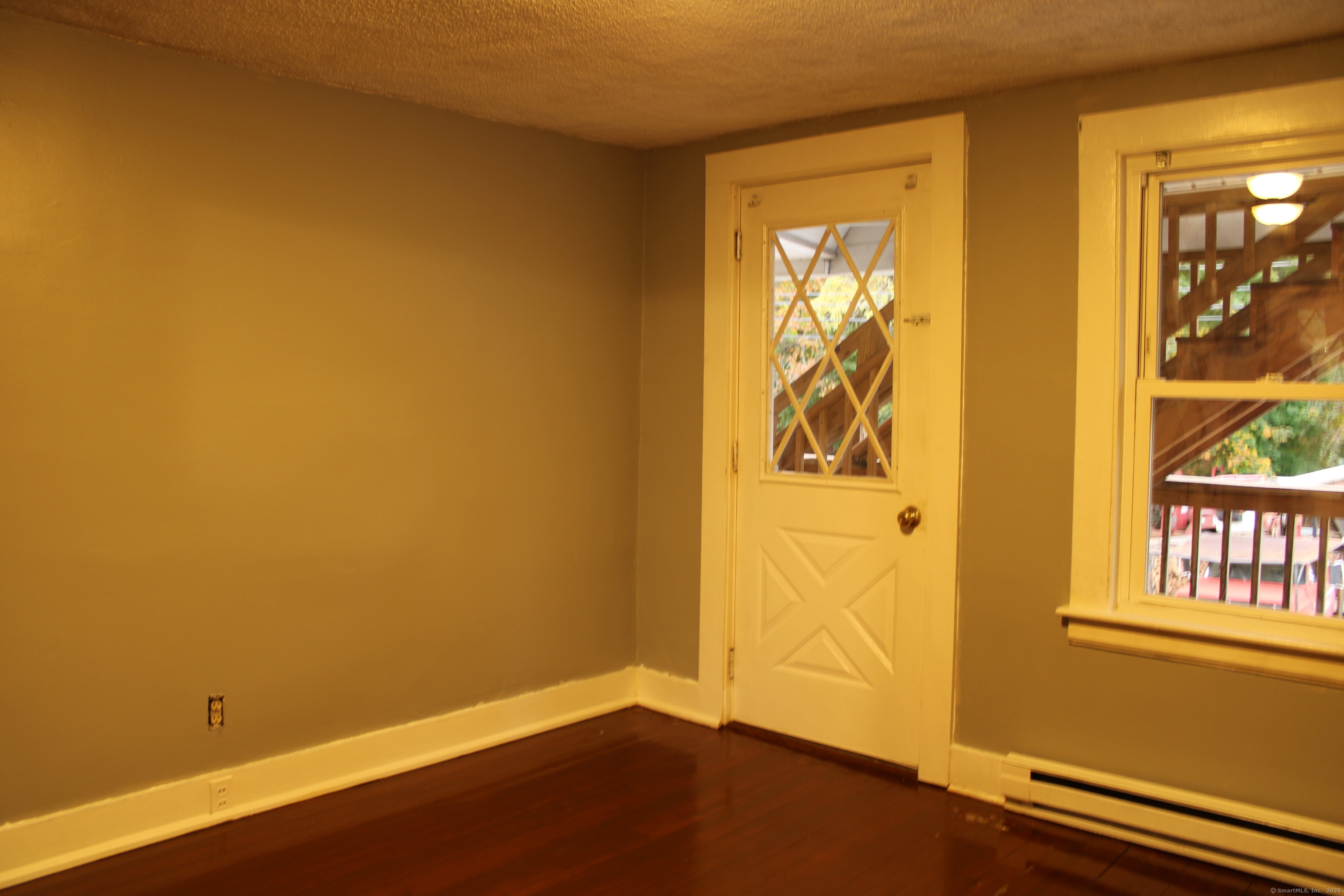 24 James Street Bristol, CT 06010 - Photo 4 of 12 a view of front door with wooden floor