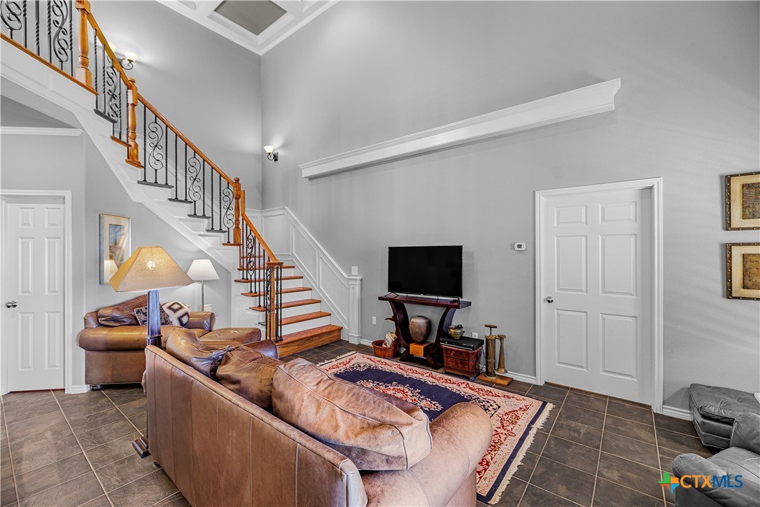 3052 Charco Road Nordheim, TX 78141 - Photo 15 of 43 a living room with furniture and a flat screen tv