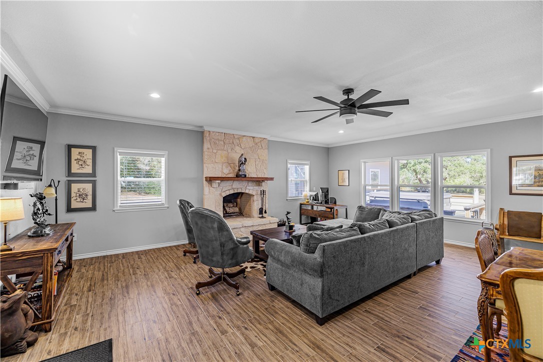 3052 Charco Road Nordheim, TX 78141 - Photo 19 of 43 a living room with furniture and a wooden floor