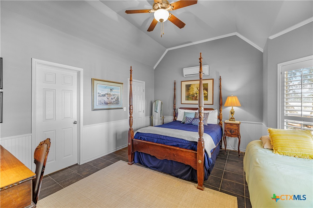 3052 Charco Road Nordheim, TX 78141 - Photo 25 of 43 a bedroom with bed and window