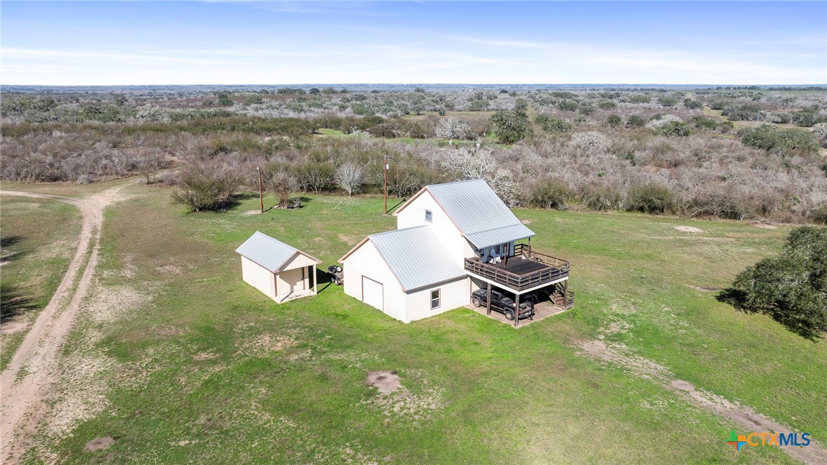 3052 Charco Road Nordheim, TX 78141 - Photo 33 of 43 a view of a lake with a yard