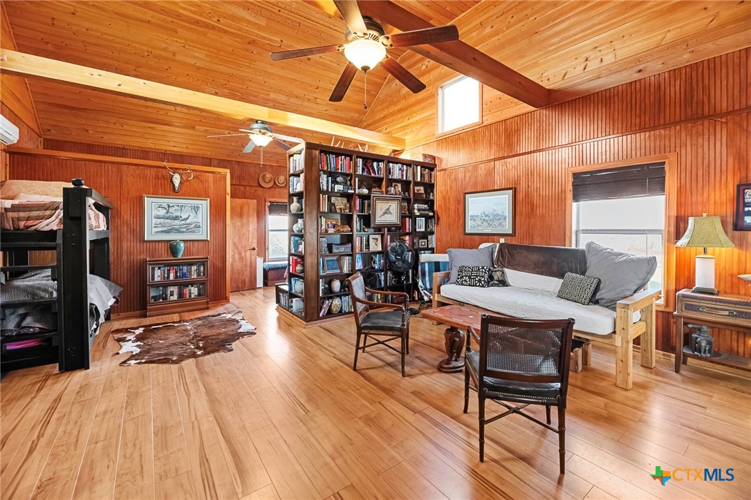 3052 Charco Road Nordheim, TX 78141 - Photo 40 of 43 a outdoor space with lots of chairs and wooden floor