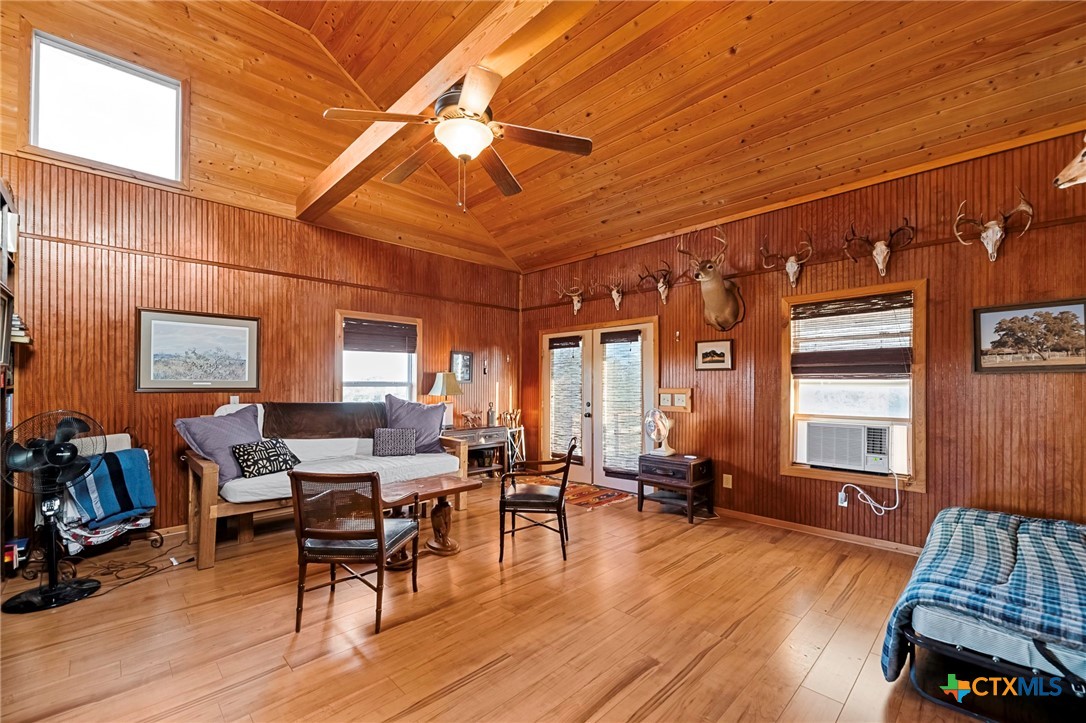 3052 Charco Road Nordheim, TX 78141 - Photo 41 of 43 a living room with furniture and wooden floor