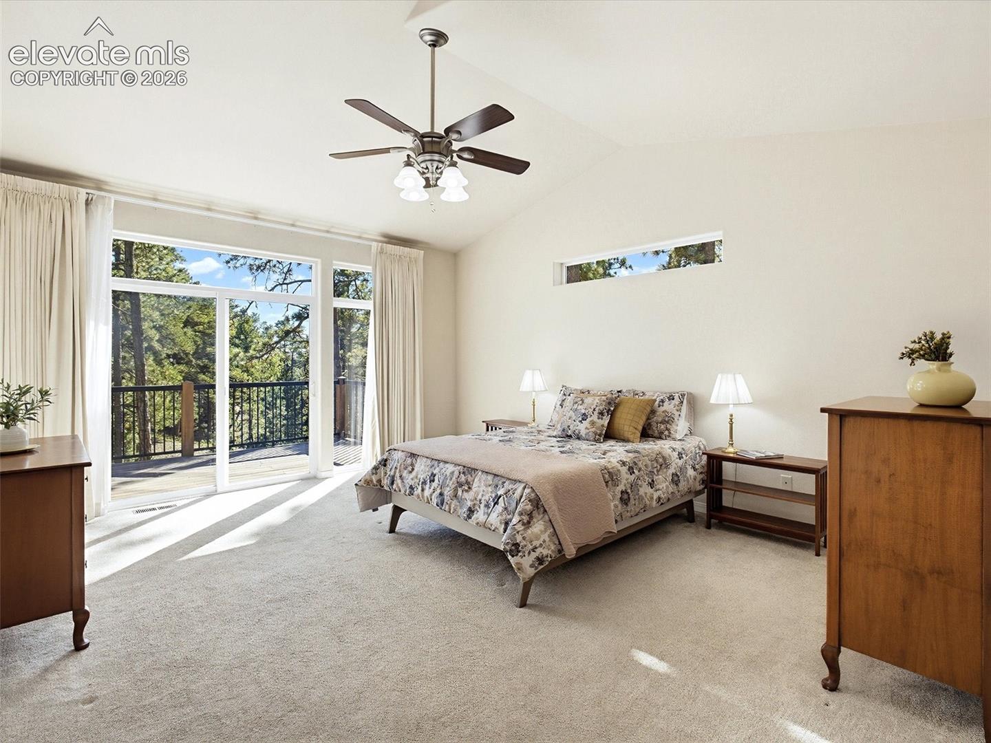 18065 Cumbres Road Peyton, CO 80831 - Photo 18 of 48 Primary Suite with walk-out to deck & views