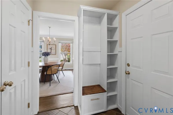 a room that has a window and a table in it